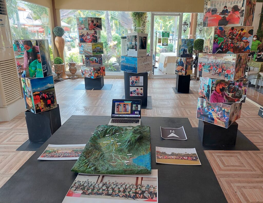 The exhibits during the 9th South-South Citizenry-based Development Academy features photos of CBDRRM activities as well as a 3D map of Salug Valley, where the event is taking place.